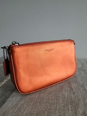 Coach Metallic Copper Orange Leather Wristlet